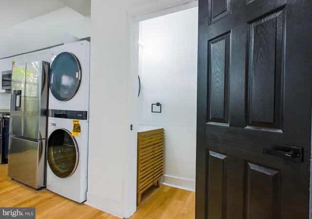 a utility room with dryer and washer