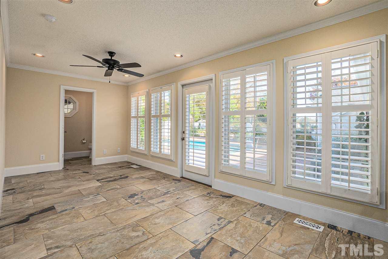 710 Packing Plant Road Smithfield, NC 27577 - Photo 22 of 30 This space is perfect for Formal Dining or Sunroom with lots of windows for natural lighting!