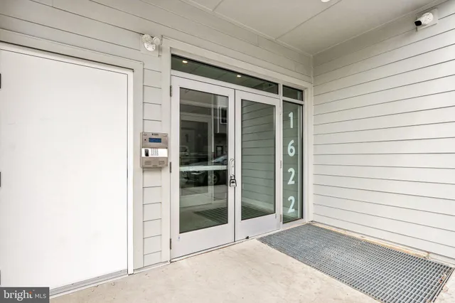 a view of front door and yard