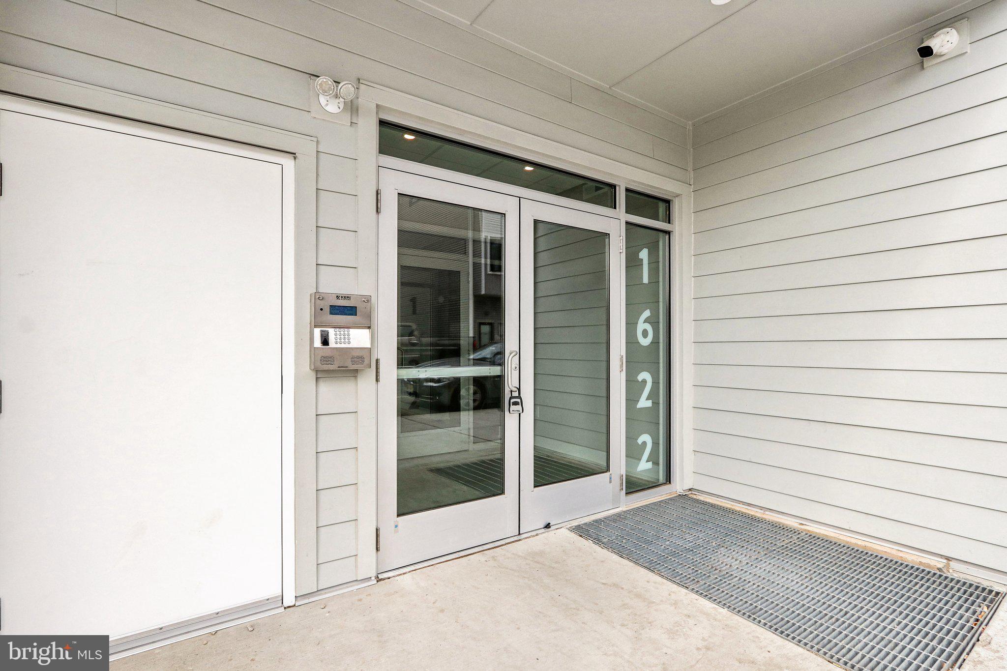 1622 Point Breeze Avenue, Unit 410 Philadelphia, PA 19145 - Photo 11 of 20 a view of front door and yard