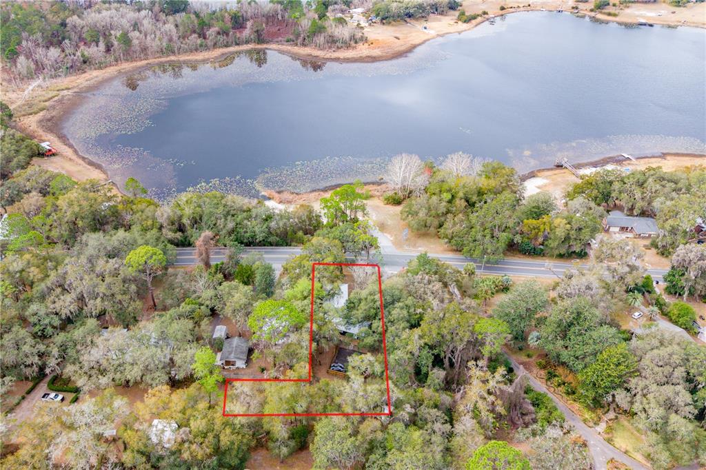 1353 Chatauqua Way Keystone Heights, FL 32656 - Photo 11 of 60 an aerial view of a houses with yard