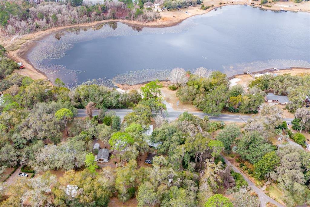 1353 Chatauqua Way Keystone Heights, FL 32656 - Photo 12 of 60 an aerial view of a houses with yard