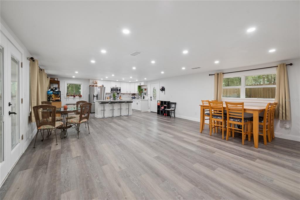 1353 Chatauqua Way Keystone Heights, FL 32656 - Photo 24 of 60 a room with furniture and a wooden floor