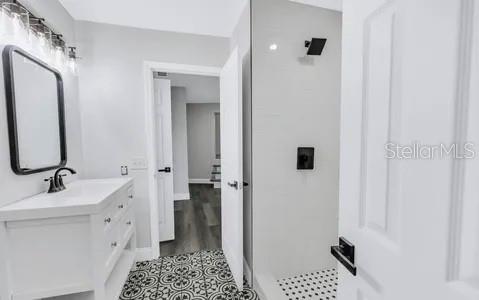 1353 Chatauqua Way Keystone Heights, FL 32656 - Photo 53 of 60 a bathroom with a sink a toilet a shower and a mirror
