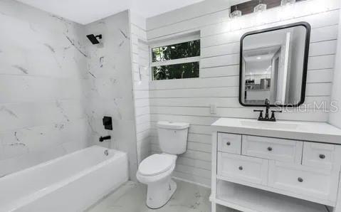 1353 Chatauqua Way Keystone Heights, FL 32656 - Photo 54 of 60 a bathroom with a toilet a sink a tub and mirror