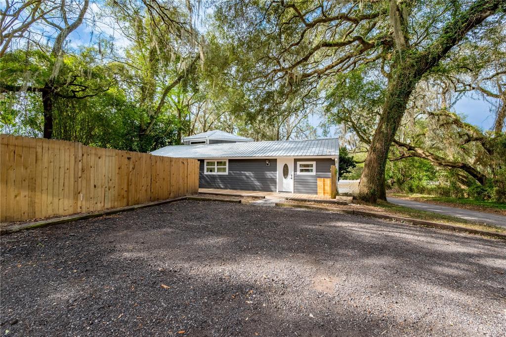 1353 Chatauqua Way Keystone Heights, FL 32656 - Photo 6 of 60 a front view of a house with a garden