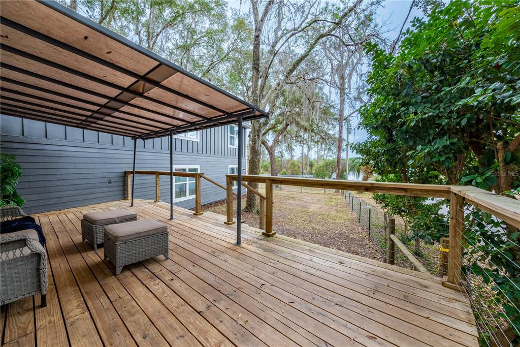1353 Chatauqua Way Keystone Heights, FL 32656 - Photo 9 of 60 a view of couches on the deck