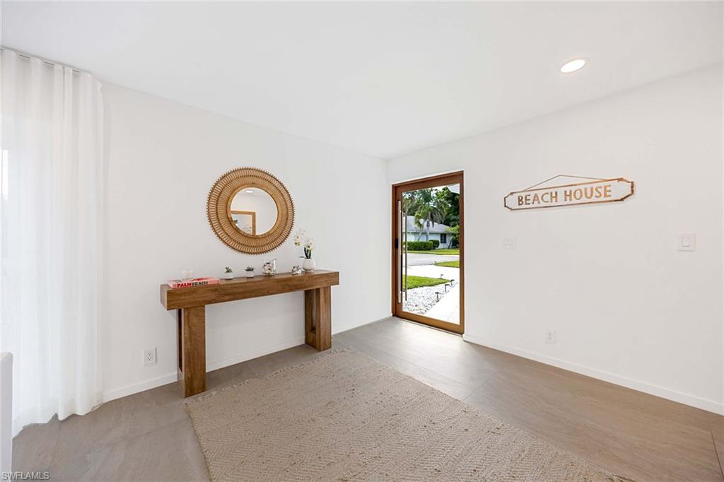 24 Rivard Road Naples, FL 34112 - Photo 5 of 29 a view of a livingroom with a furniture