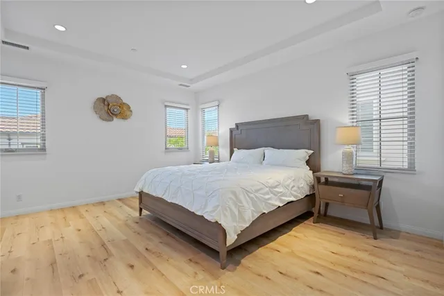 a bedroom with a bed and furniture