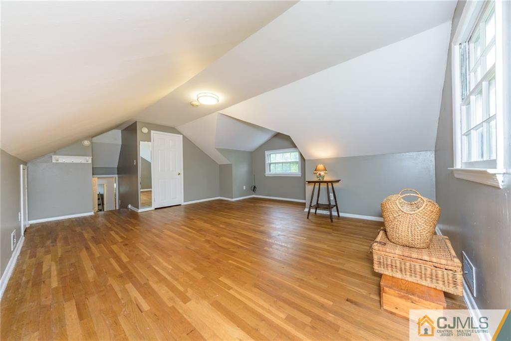 7 Bradford Road Edison, NJ 08820 - Photo 25 of 34 a view of empty room with wooden floor