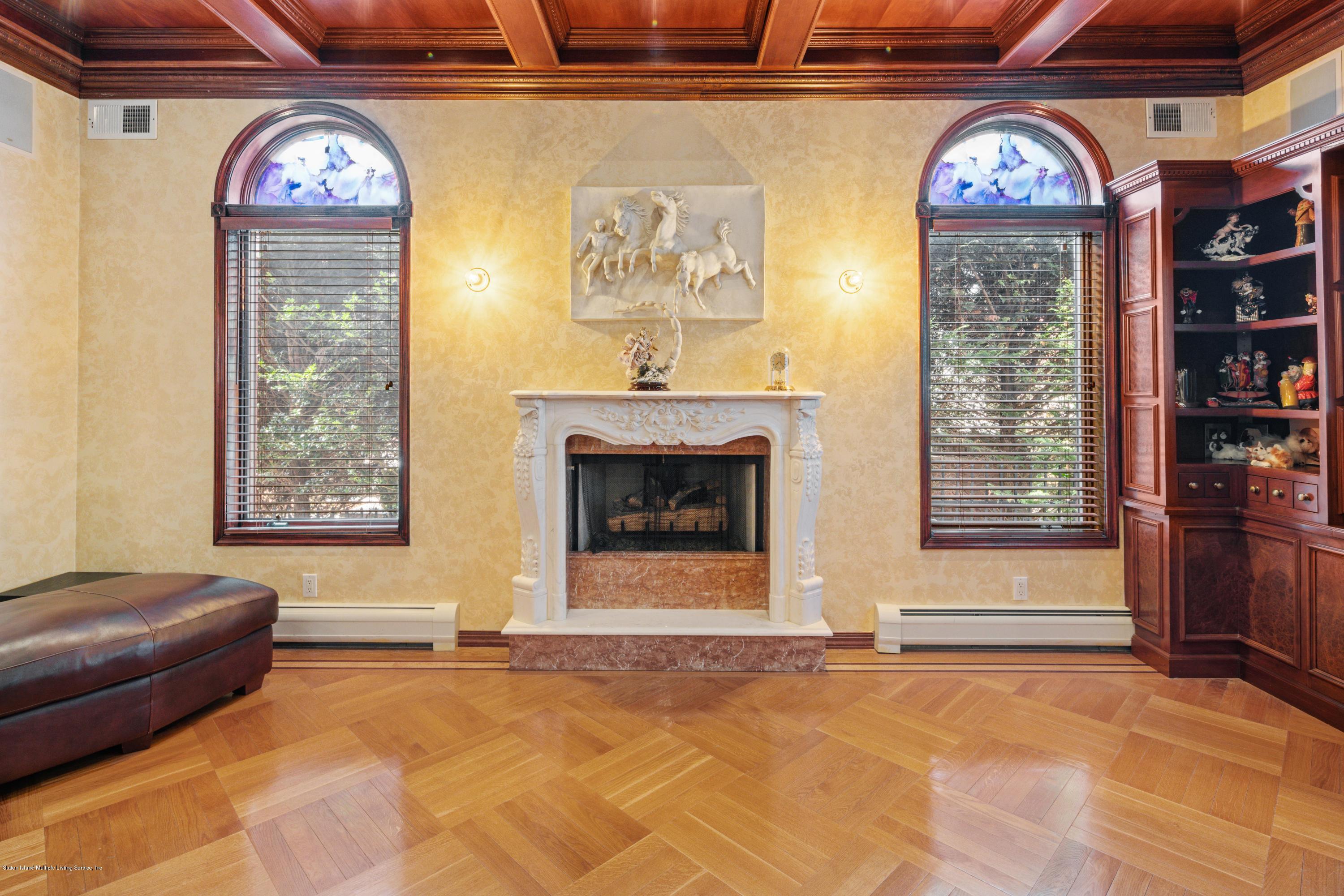 163 4 Corners Road Staten Island, NY 10304 - Photo 15 of 37 Fireplace in Family Room