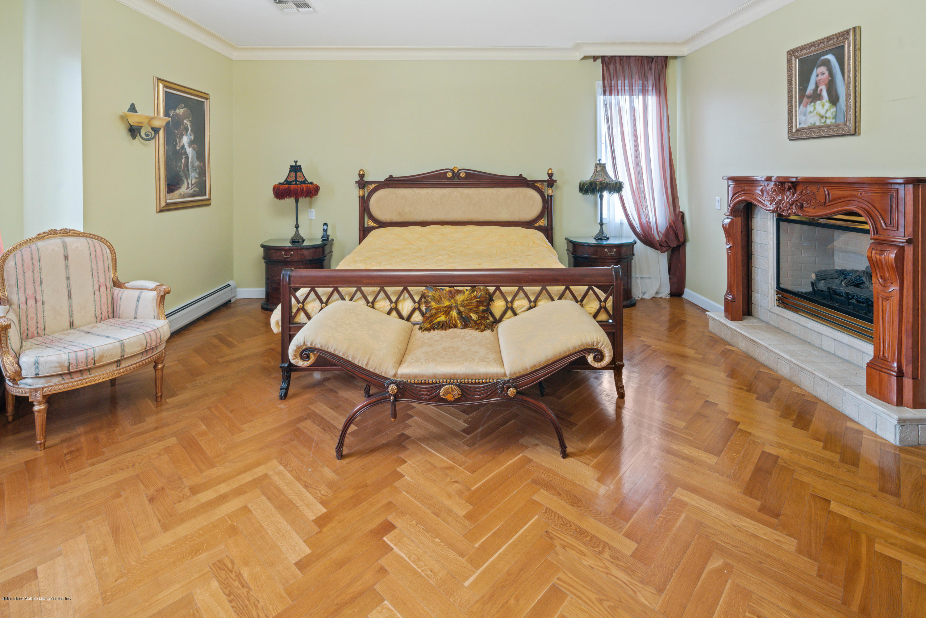 163 4 Corners Road Staten Island, NY 10304 - Photo 23 of 37 Master Bedroom with fireplace