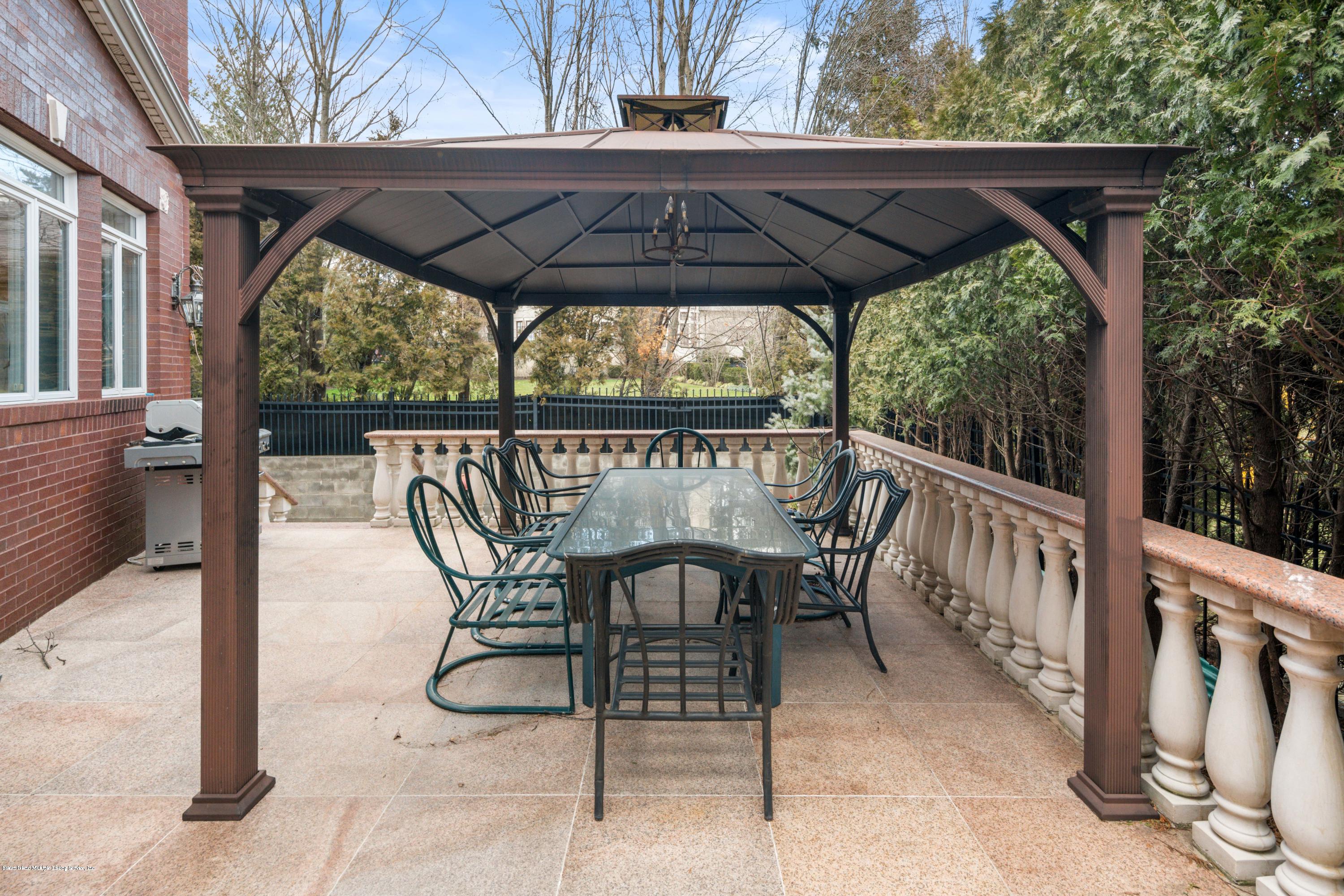 163 4 Corners Road Staten Island, NY 10304 - Photo 33 of 37 Patio with Gazebo