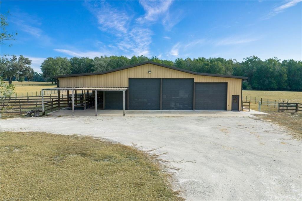 2051 Southeast 155th Street Summerfield, FL 34491 - Photo 12 of 48 a front view of a house with a yard