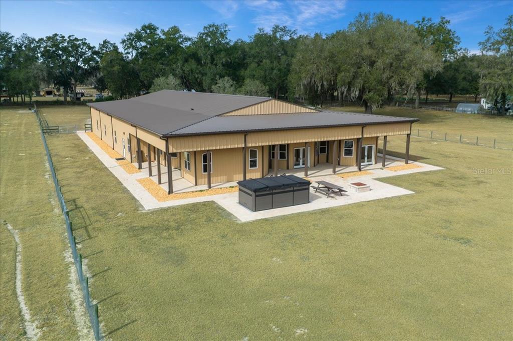 2051 Southeast 155th Street Summerfield, FL 34491 - Photo 14 of 48 a view of a patio with swimming pool