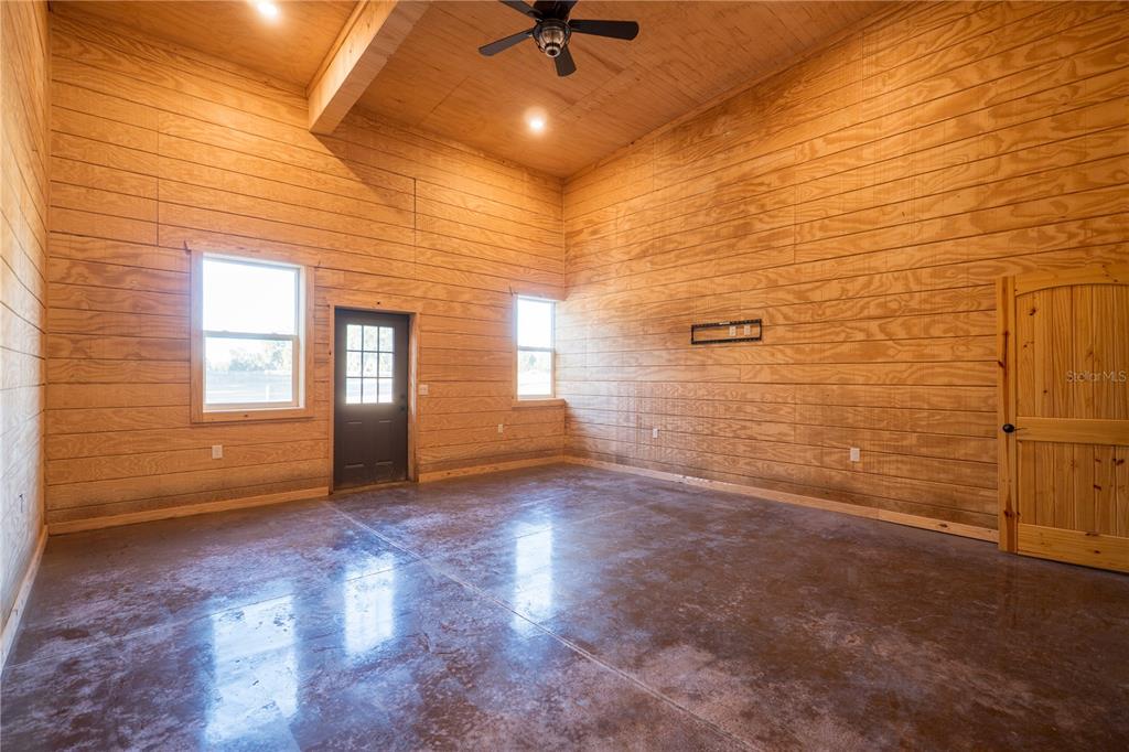 2051 Southeast 155th Street Summerfield, FL 34491 - Photo 25 of 48 a view of an empty room with a window