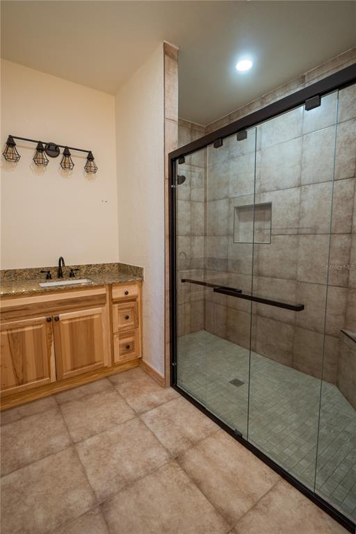 2051 Southeast 155th Street Summerfield, FL 34491 - Photo 33 of 48 a bathroom with a shower and a sink