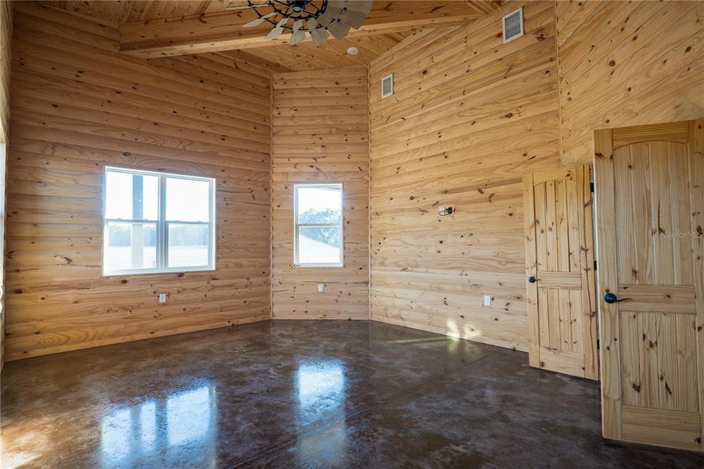 2051 Southeast 155th Street Summerfield, FL 34491 - Photo 36 of 48 wooden floor in an empty room