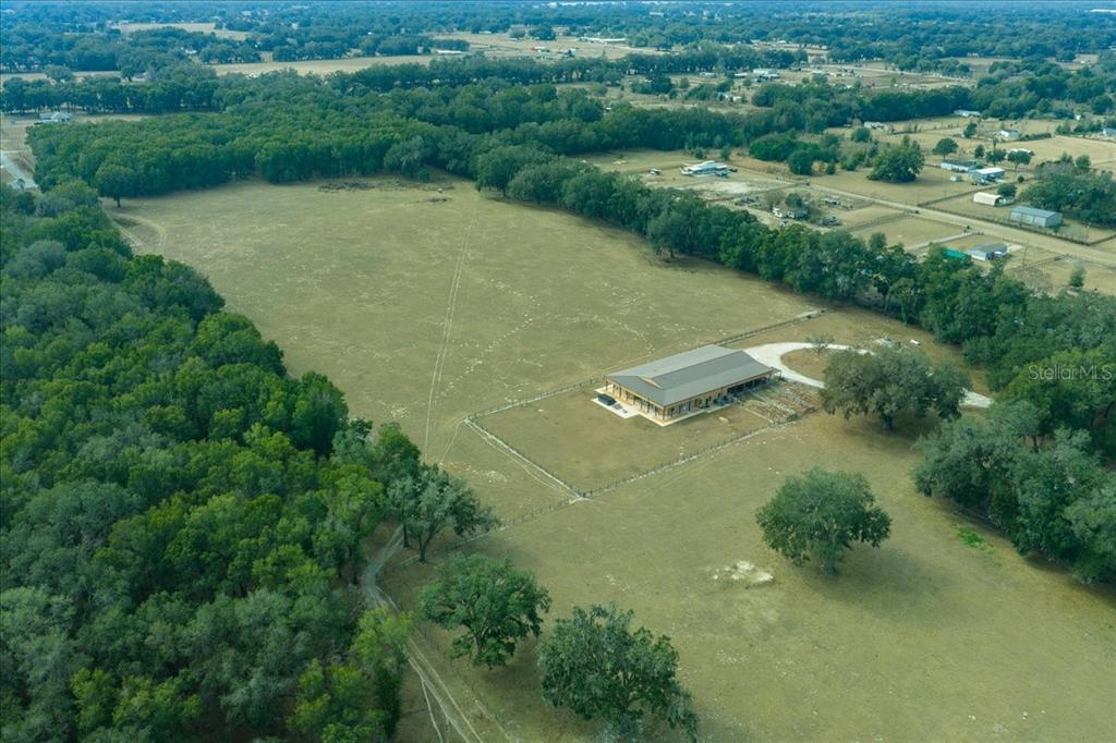 2051 Southeast 155th Street Summerfield, FL 34491 - Photo 7 of 48 an aerial view of a house