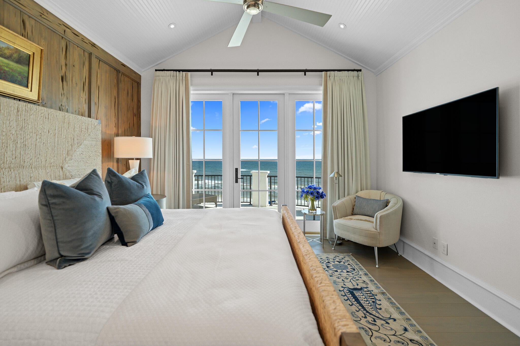 24 Escape Dr Inlet Beach Inlet Beach, FL 32461 - Photo 39 of 69 a bedroom with a bed a couch and a flat tv screen