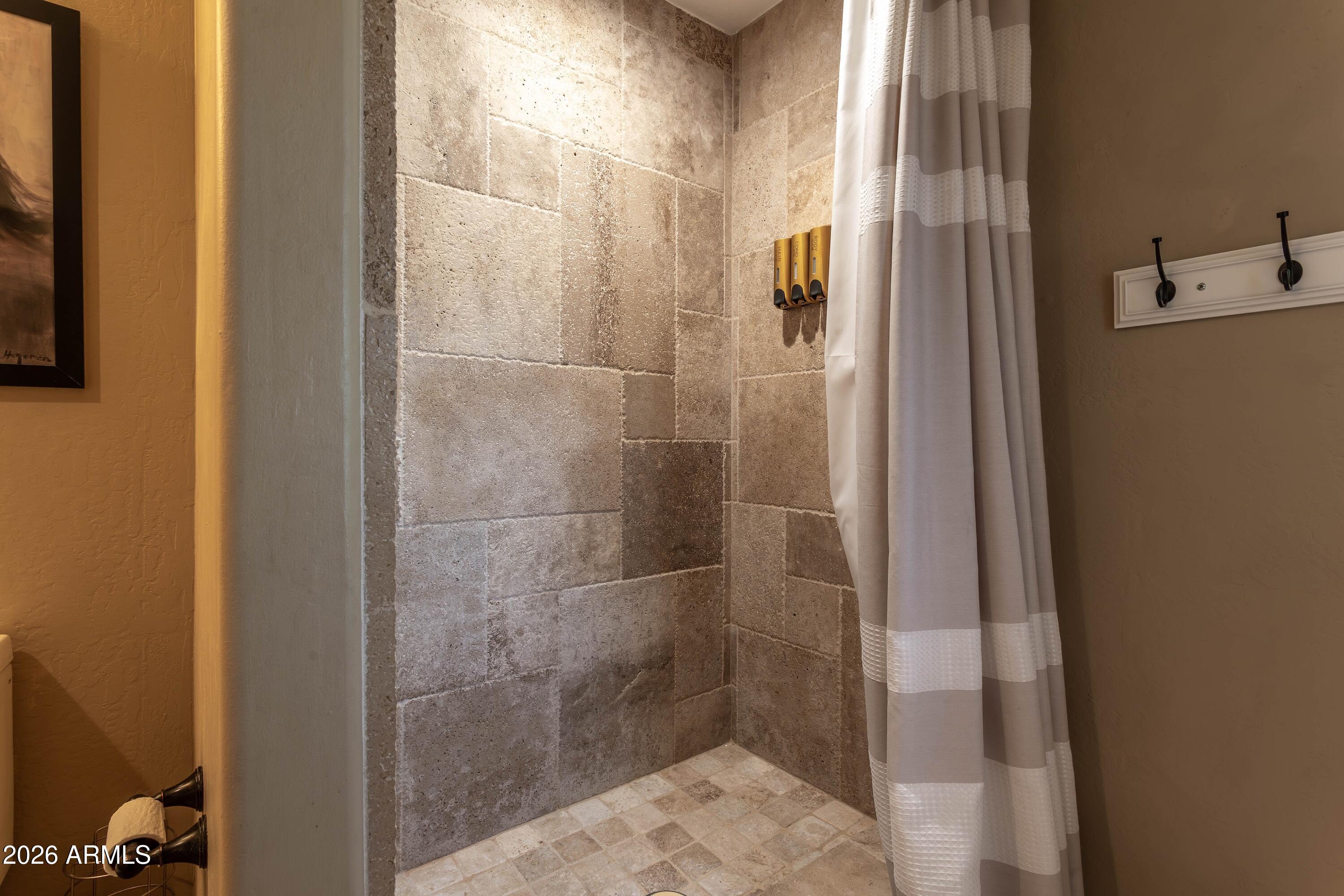 4727 East Rancho Caliente Drive Cave Creek, AZ 85331 - Photo 35 of 78 downstairs hall shower