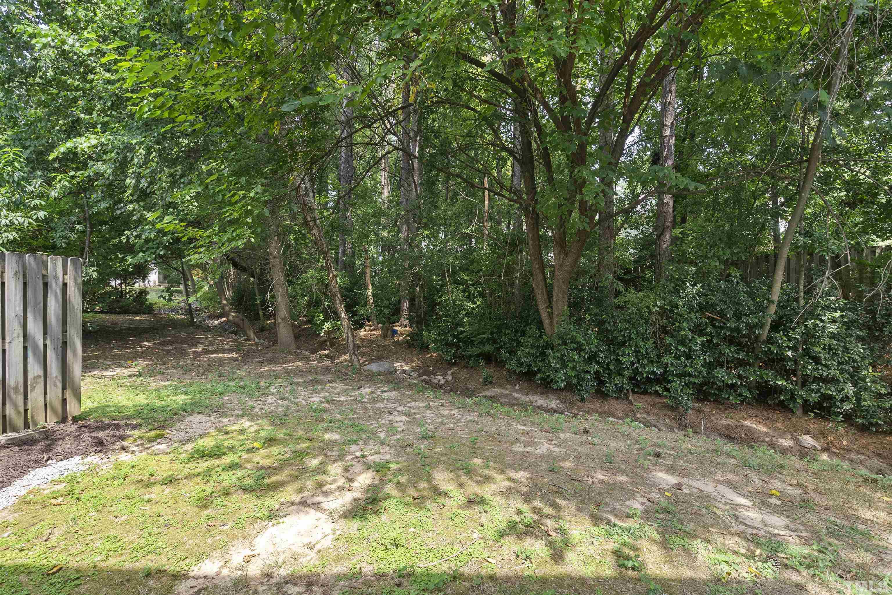 7779 Falcon Rest Circle Raleigh, NC 27615 - Photo 28 of 28 a view of backyard with green space