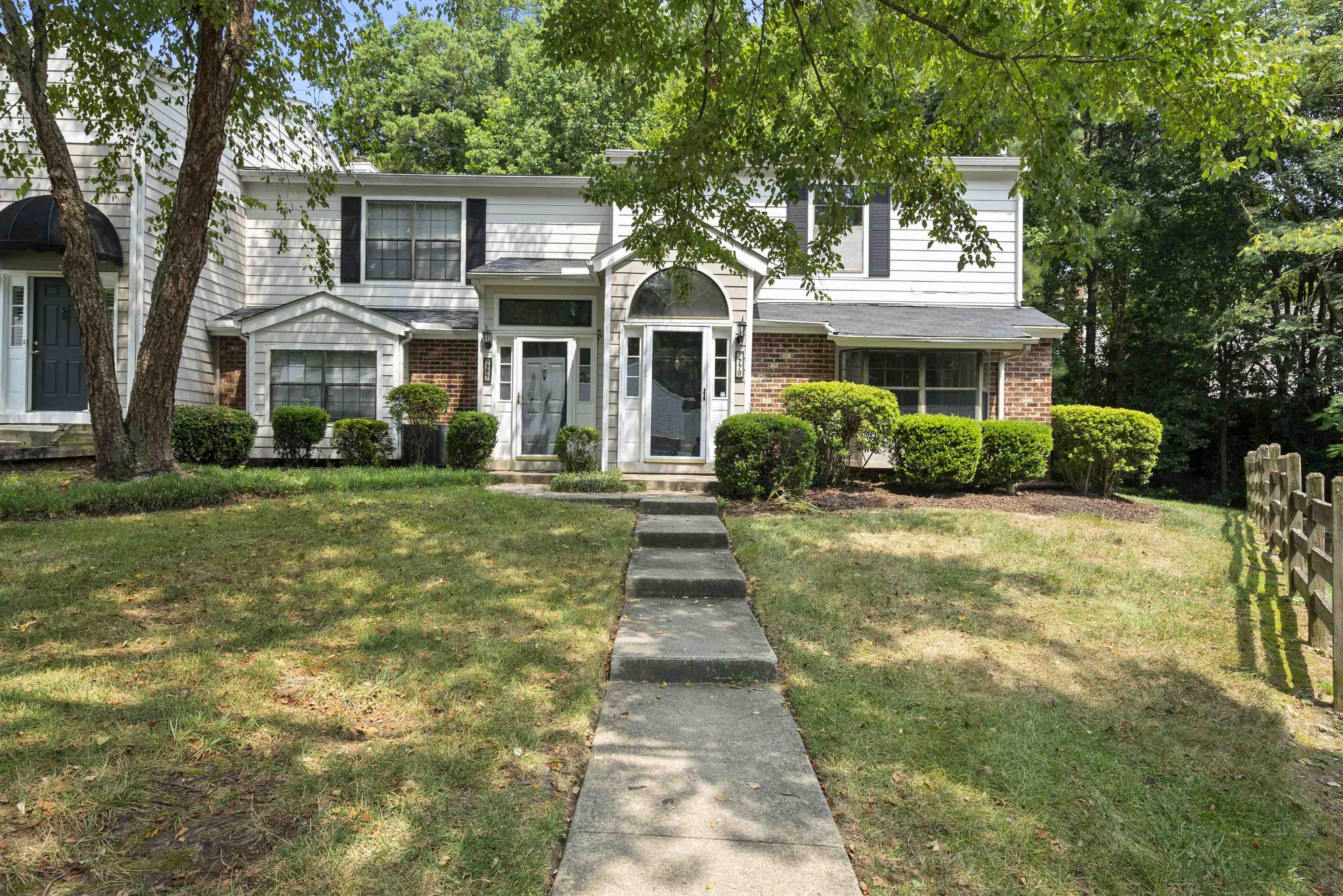 7779 Falcon Rest Circle Raleigh, NC 27615 - Photo 3 of 28 a front view of a house with a yard