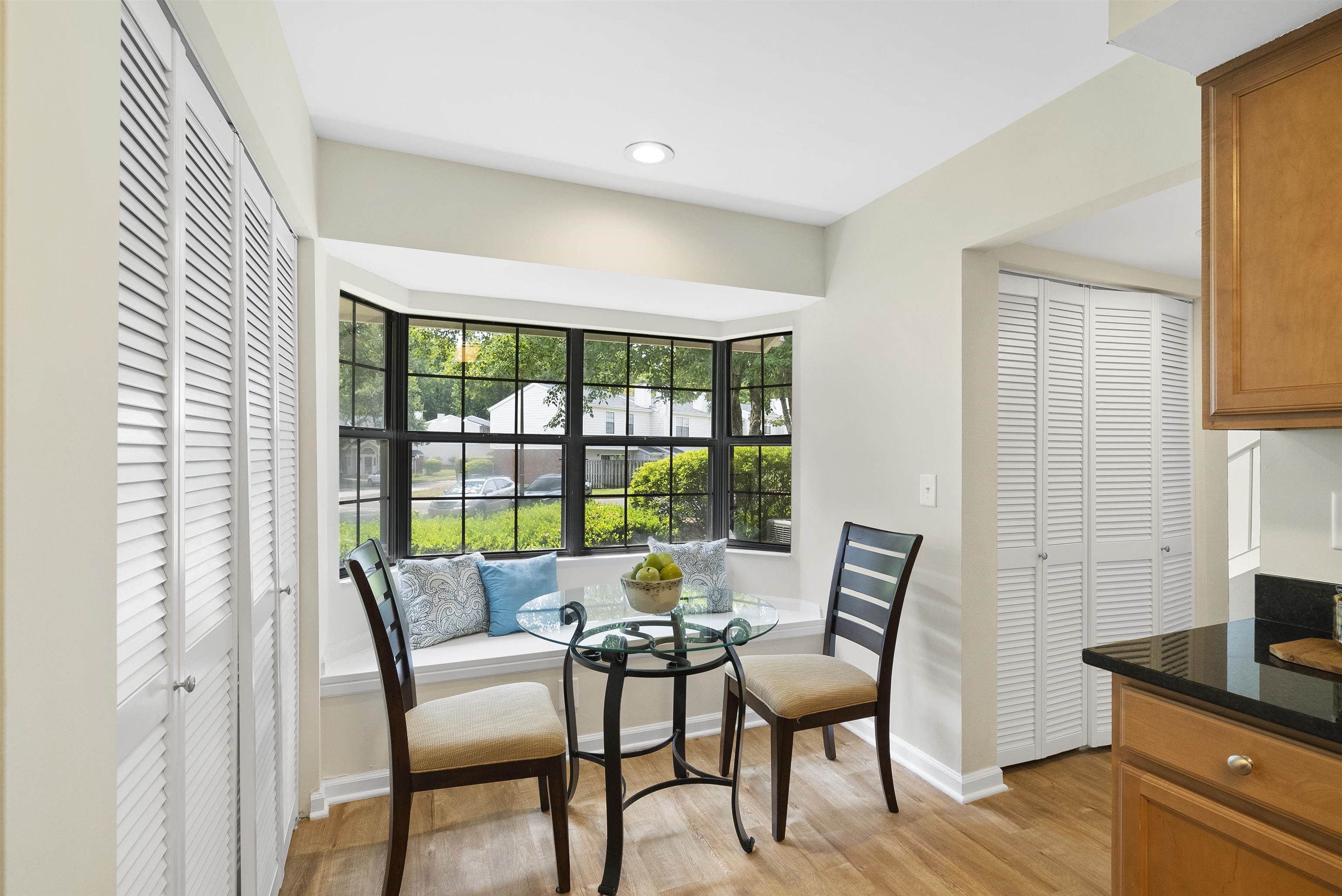 7779 Falcon Rest Circle Raleigh, NC 27615 - Photo 5 of 28 a dining room with furniture and wooden floor