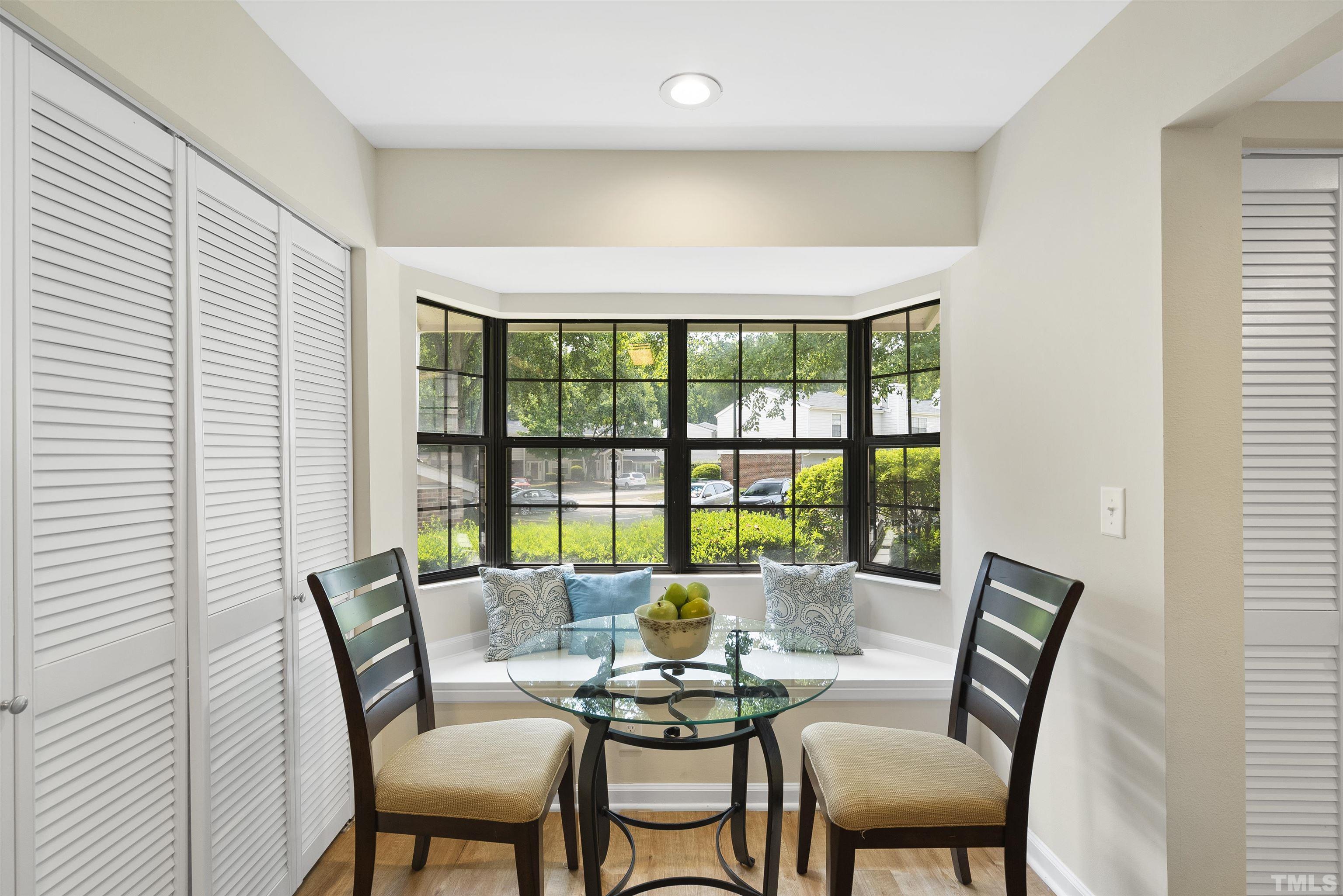 7779 Falcon Rest Circle Raleigh, NC 27615 - Photo 6 of 28 a dining room with furniture and window