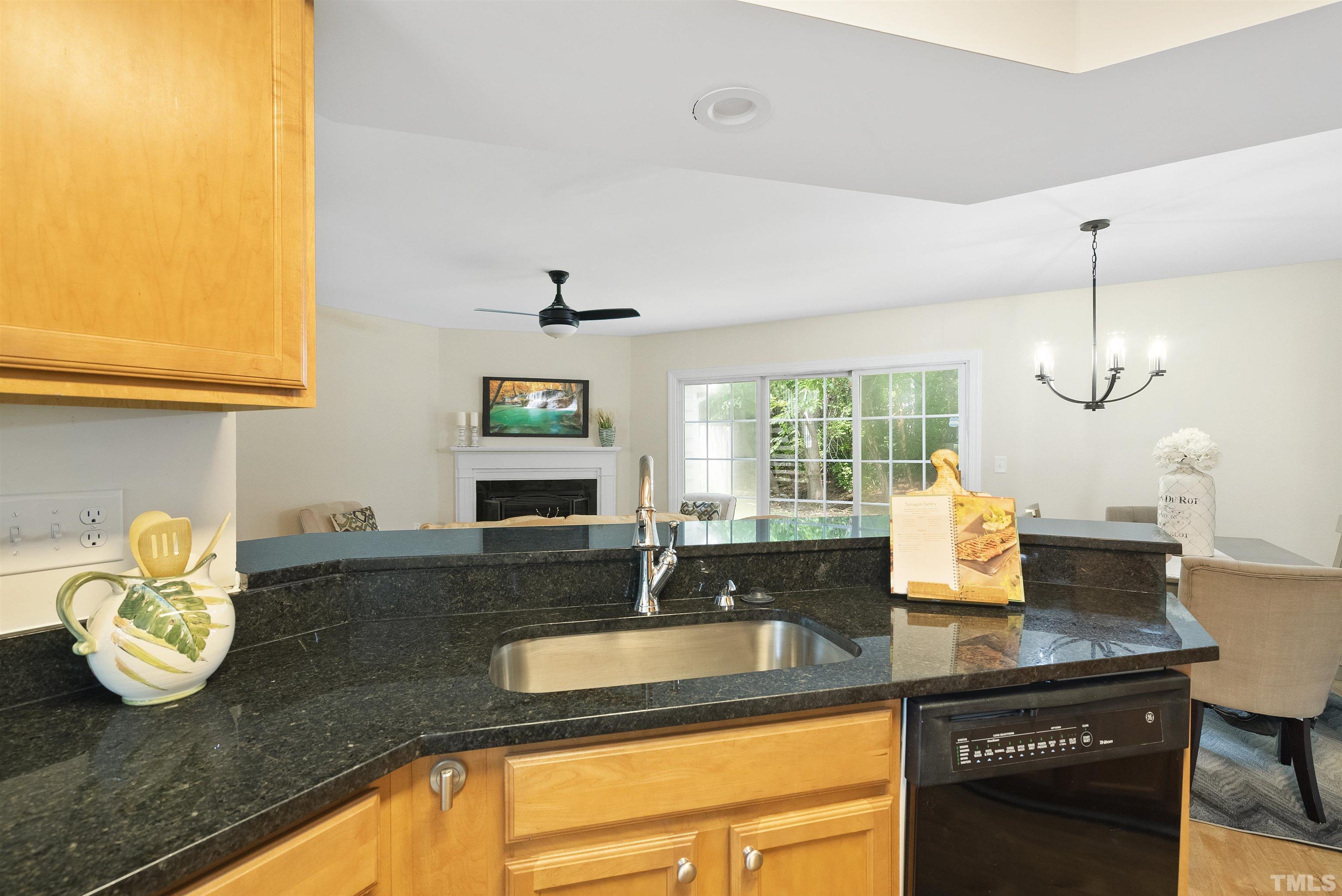 7779 Falcon Rest Circle Raleigh, NC 27615 - Photo 10 of 28 a kitchen with sink and window