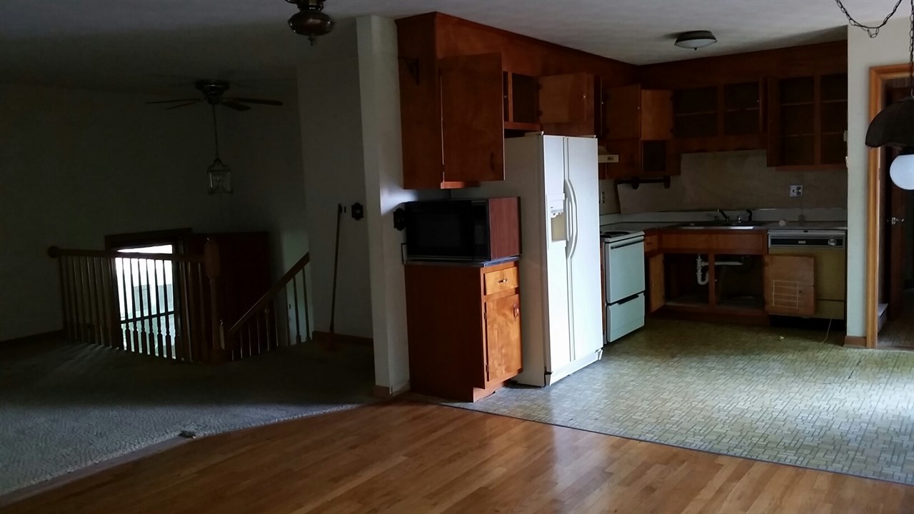 2301 Hewitt Road Swoope, VA 24479 - Photo 3 of 14 a kitchen with a refrigerator and a stove