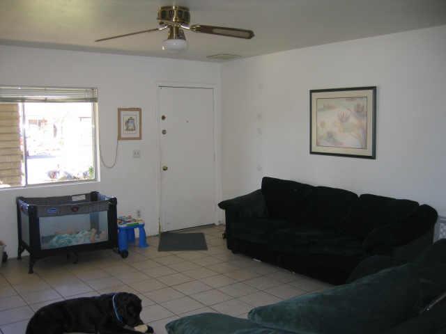 4019 East St John Road Phoenix, AZ 85032 - Photo 6 of 6 a living room with furniture and a window