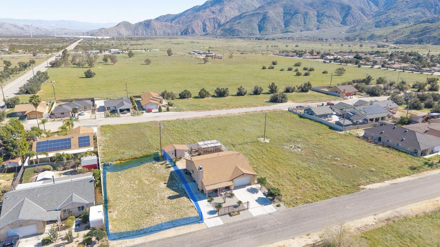 14280 Rafael Street Cabazon, CA 92230 - Photo 3 of 3 an aerial view of residential houses with outdoor space