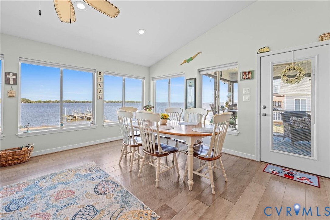 683 Villa Road Claremont, VA 23881 - Photo 16 of 28 a view of a dining room with furniture window and wooden floor