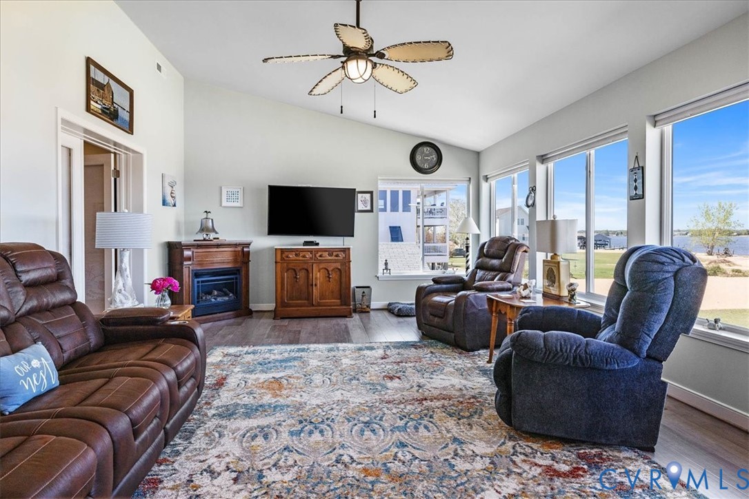683 Villa Road Claremont, VA 23881 - Photo 19 of 28 a living room with furniture and a flat screen tv