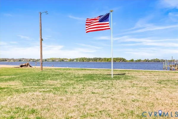a view of a field with a big yard