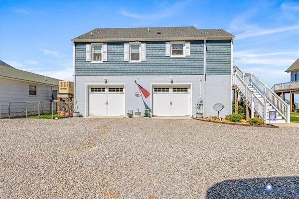 a view of a house with a garage