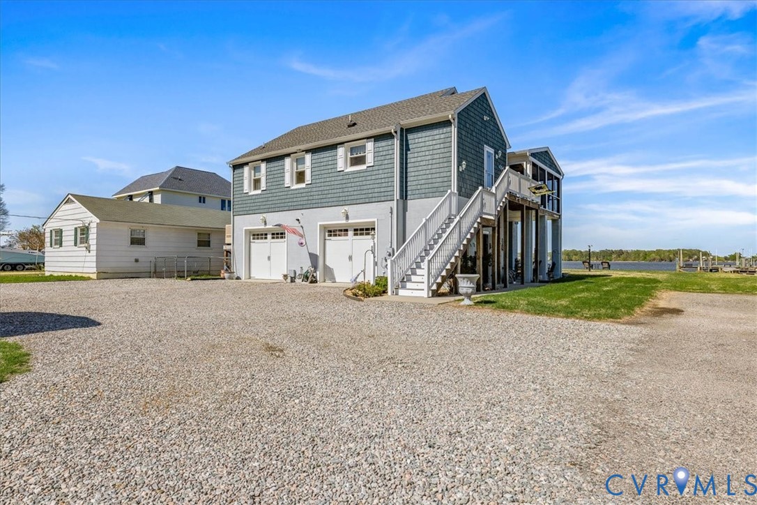 683 Villa Road Claremont, VA 23881 - Photo 6 of 28 a view of house with a yard
