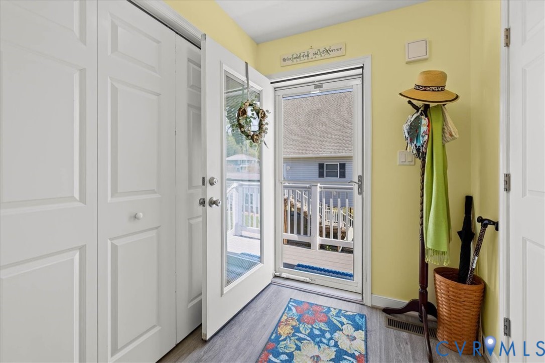 683 Villa Road Claremont, VA 23881 - Photo 7 of 28 a view of an entryway with wooden floor
