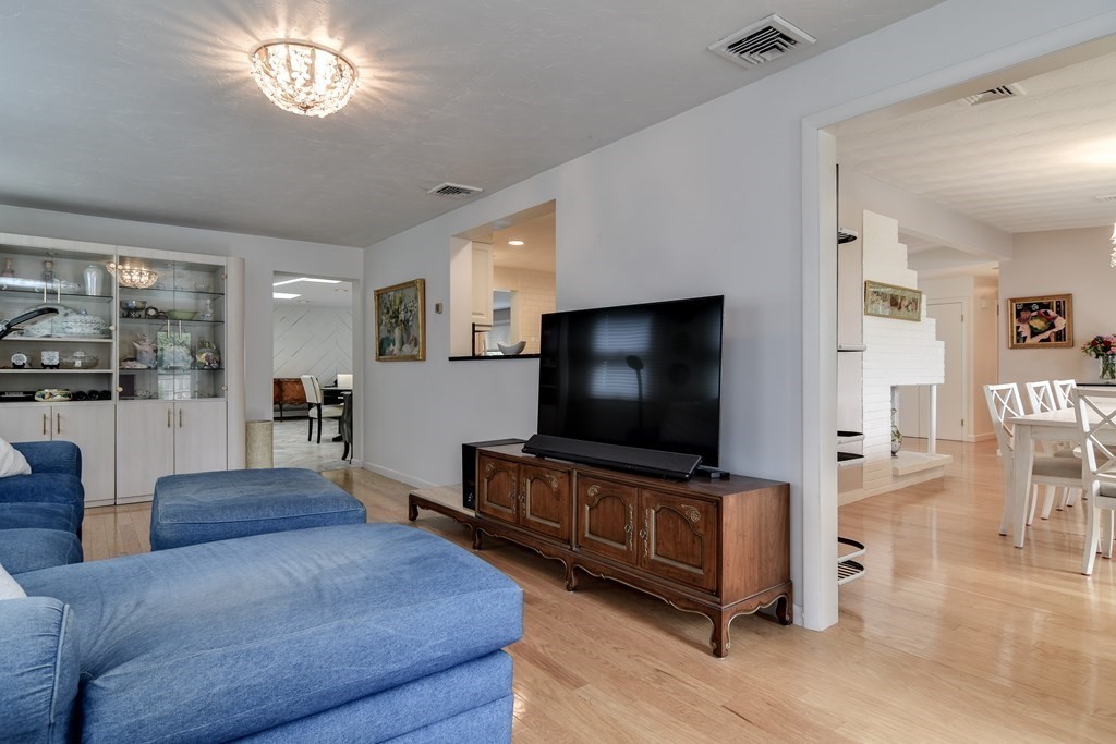 41 Lohnes Road Framingham, MA 01701 - Photo 15 of 36 a living room with furniture and a flat screen tv