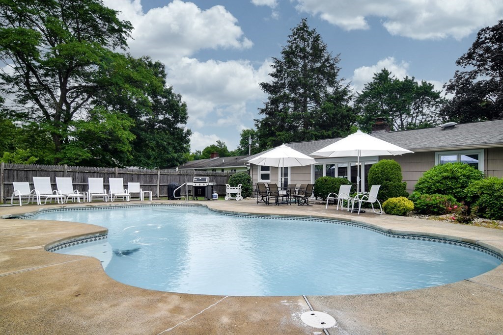 41 Lohnes Road Framingham, MA 01701 - Photo 28 of 36 a view of a swimming pool and lounge chair