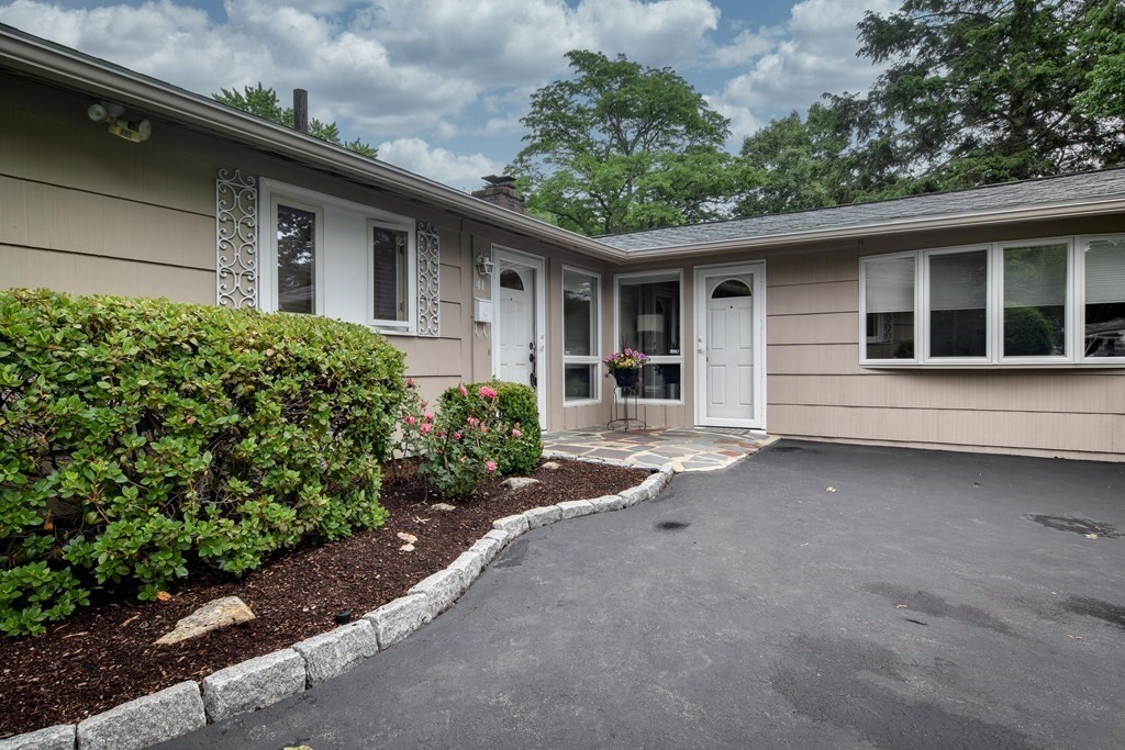 41 Lohnes Road Framingham, MA 01701 - Photo 3 of 36 a front view of a house with a yard