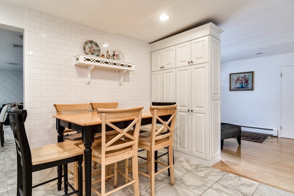 41 Lohnes Road Framingham, MA 01701 - Photo 10 of 36 a dining room that has a table and chairs in it
