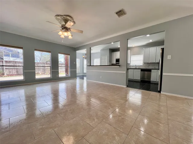 a kitchen with stainless steel appliances a refrigerator and a sink