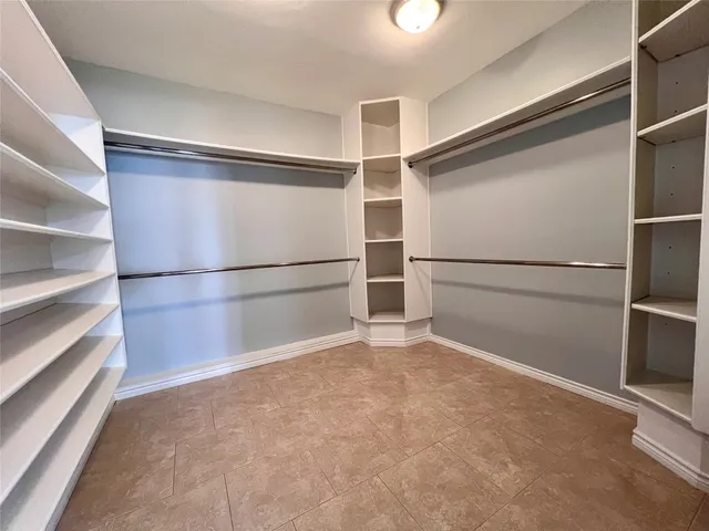 a bathroom with a sink a vanity and a mirror
