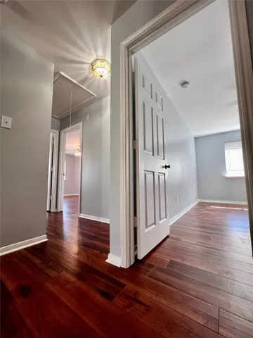 wooden floor in a hall with an entryway