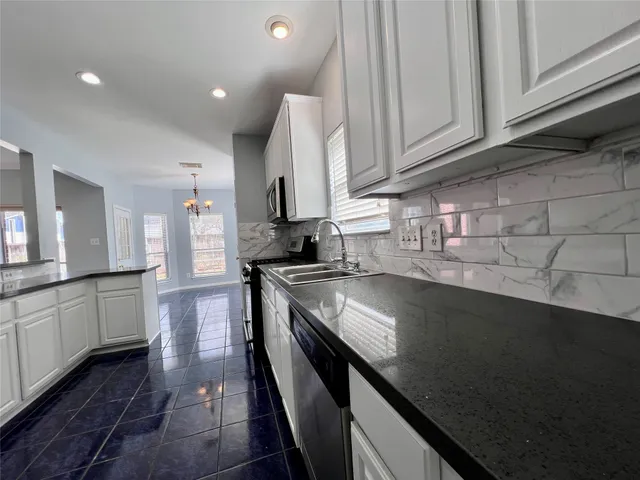 a view of an entryway with a livingroom