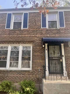 1329 East 89th Place Chicago, IL 60619 - Photo 2 of 11 a building with a window