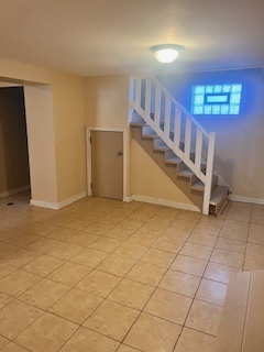 1329 East 89th Place Chicago, IL 60619 - Photo 8 of 11 a view of an entryway with a window
