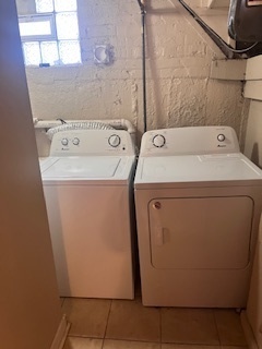 1329 East 89th Place Chicago, IL 60619 - Photo 9 of 11 a utility room with dryer and washer